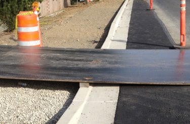 Using Steel Road Plates to Fill Holes in Construction